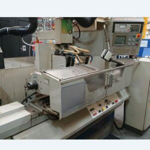 Win Win company’s Jones & Shipman precision grinding machine in an industrial workshop, featuring a control panel, enclosed work area, and manual interface for high-accuracy surface and cylindrical grinding operations.