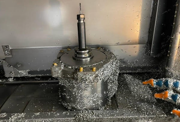 Okuma MA-40HA Twin Pallet Horizontal Machining Centre in a clean workshop environment, featuring a beige and blue body with a front viewing window and integrated control panel.