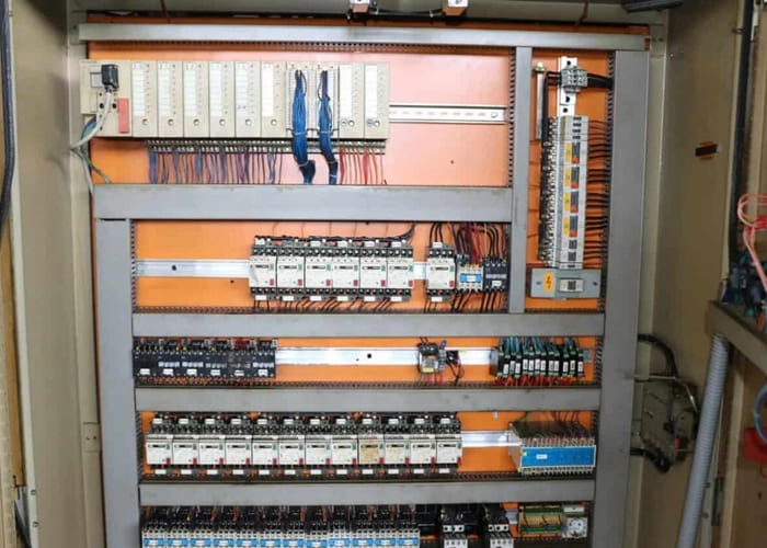 Win Win company’s RID 154G12 rotary transfer machine in an industrial facility, featuring multiple machining stations arranged in a circular configuration for automated, high-volume production processes