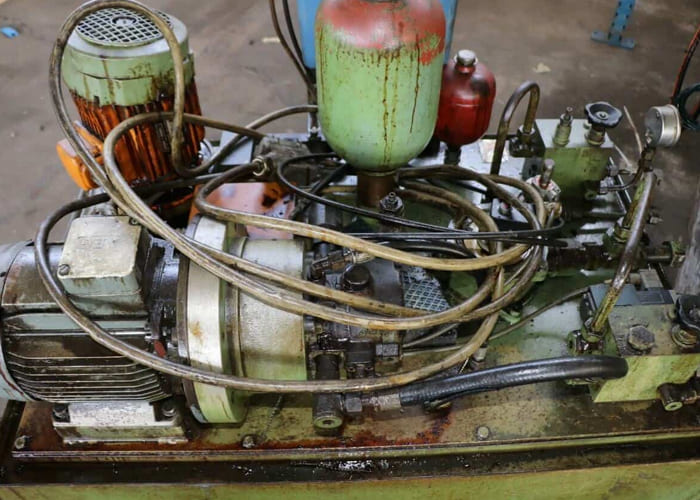 Win Win company’s RID 154G12 rotary transfer machine in an industrial facility, featuring multiple machining stations arranged in a circular configuration for automated, high-volume production processes