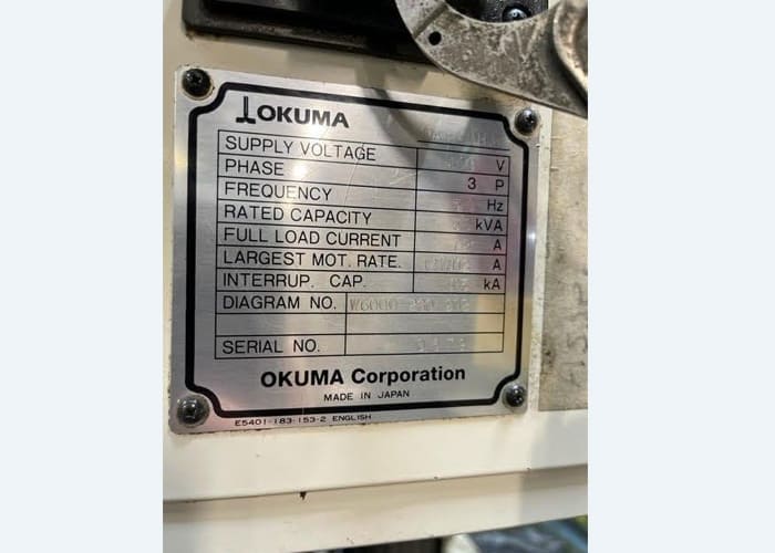 Okuma MA-40HA Twin Pallet Horizontal Machining Centre in a clean workshop environment, featuring a beige and blue body with a front viewing window and integrated control panel.
