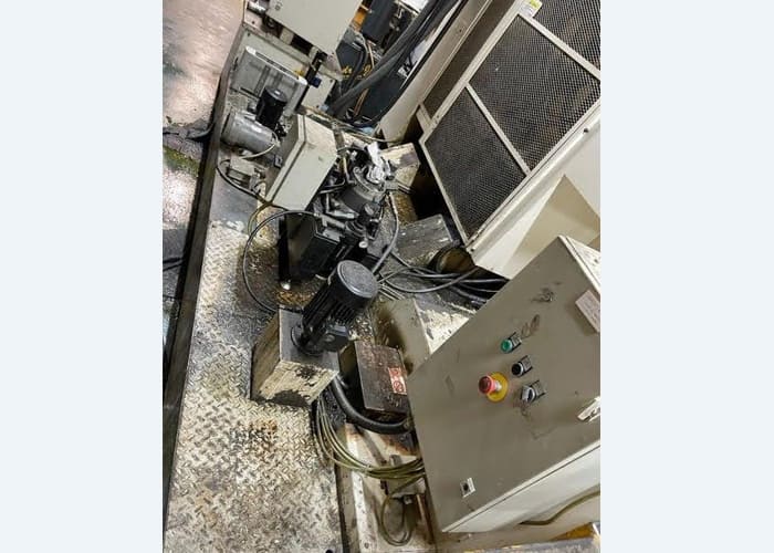 Okuma MA-40HA Twin Pallet Horizontal Machining Centre in a clean workshop environment, featuring a beige and blue body with a front viewing window and integrated control panel.