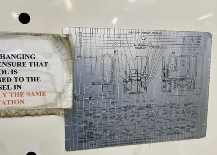 Okuma MA-40HA Twin Pallet Horizontal Machining Centre in a clean workshop environment, featuring a beige and blue body with a front viewing window and integrated control panel.